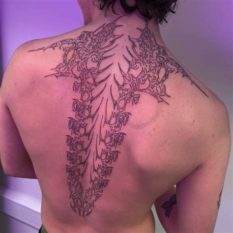 cool back tattoos|meaningful back tattoos for men.